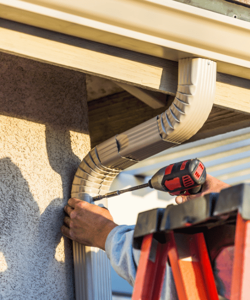 new gutters being installed